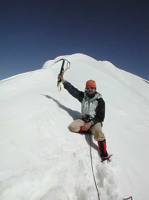 Erik Tanghe on the summit of Mont Brulé