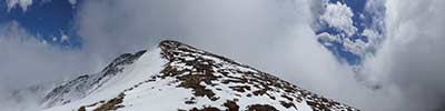 Close to the summit of the pic Saint Barthelemy in spring during bad weather with plenty snow