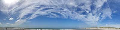 Whispy clouds at the beach of Rotterdam; Netherlands