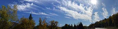 Cirrus clouds over a road